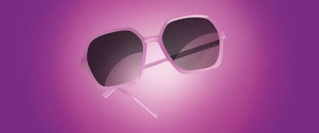 Pink sunglasses on a pink and purple background