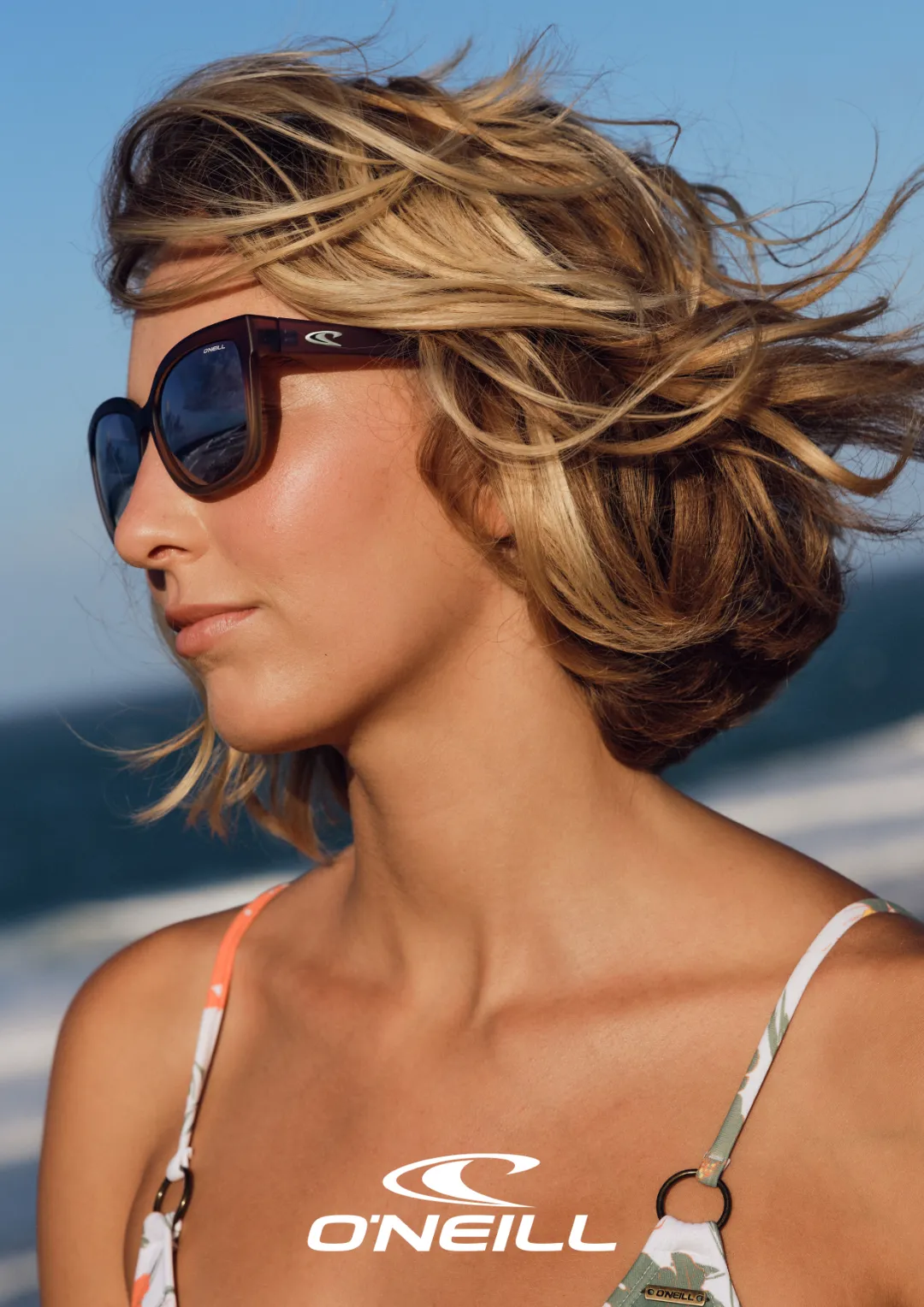 woman wearing o'neill sunwear at the beach