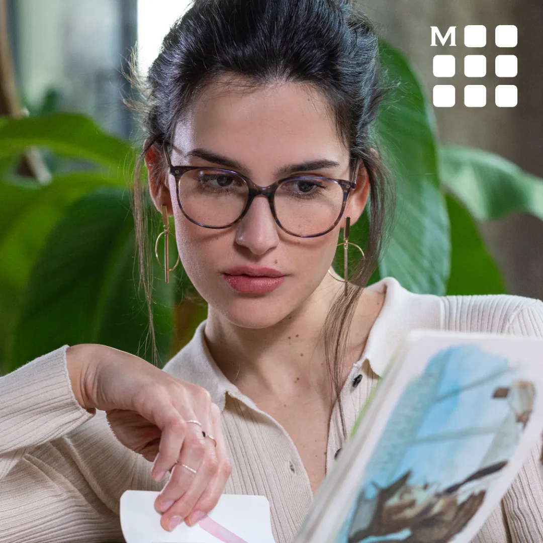 woman wearing moleskine eyeglasses