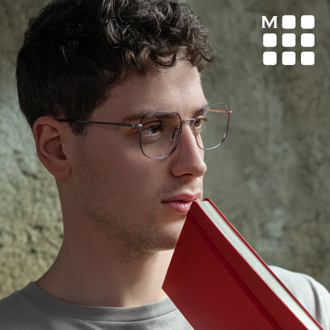 man wearing moleskine eyeglasses