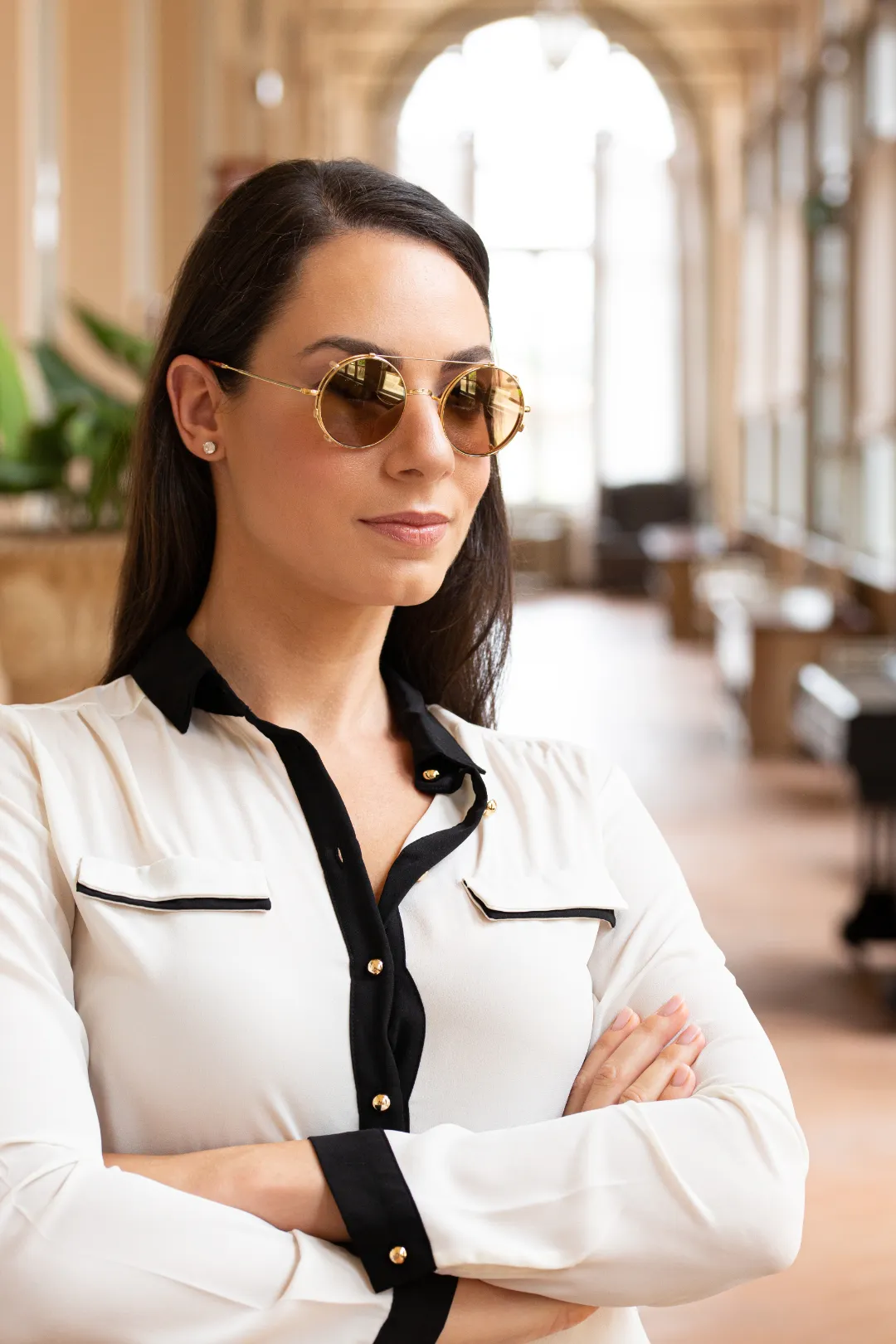 woman wearing round savile row sunglasses