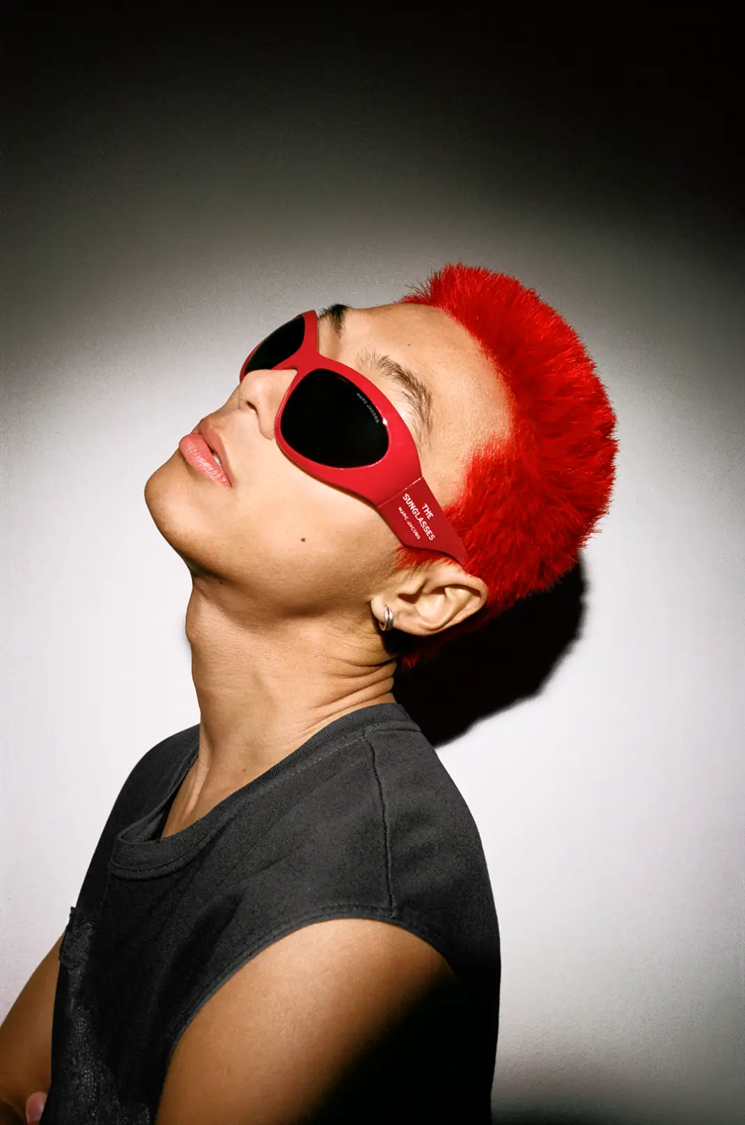 model wearing red marc jacobs sunglasses