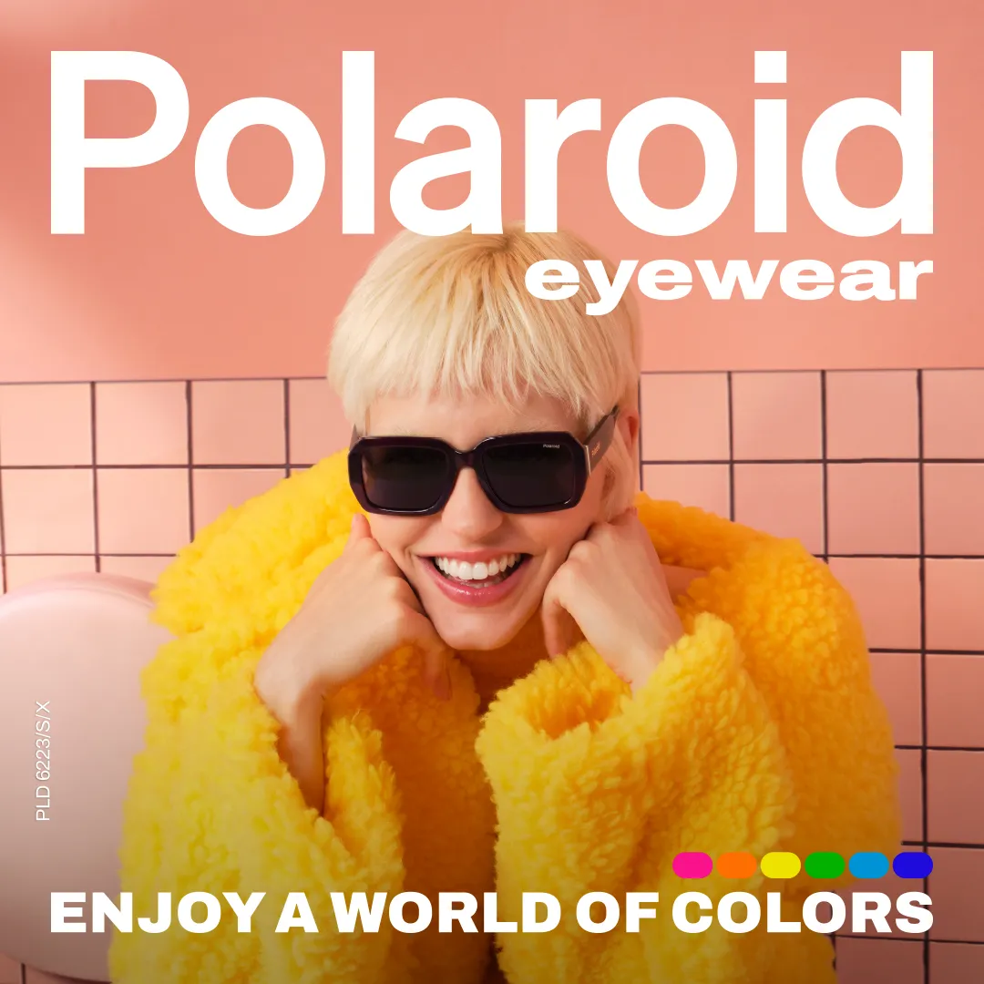 smiling model wearing polaroid sunwear